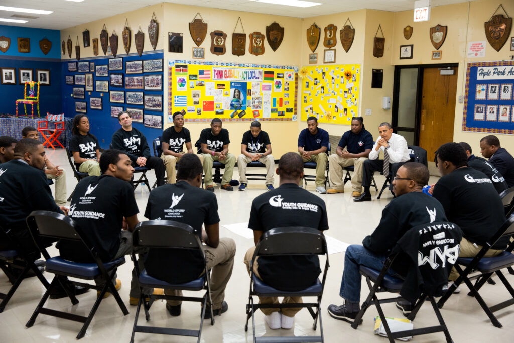 President Barack Obama participates in a "Becoming a Man" program roundtable at the Hyde Park Career Academy in Chicago, Ill., Feb. 15, 2013.