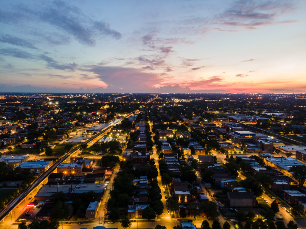 Aerial night time drone shot of a local neighborhood in Chicago