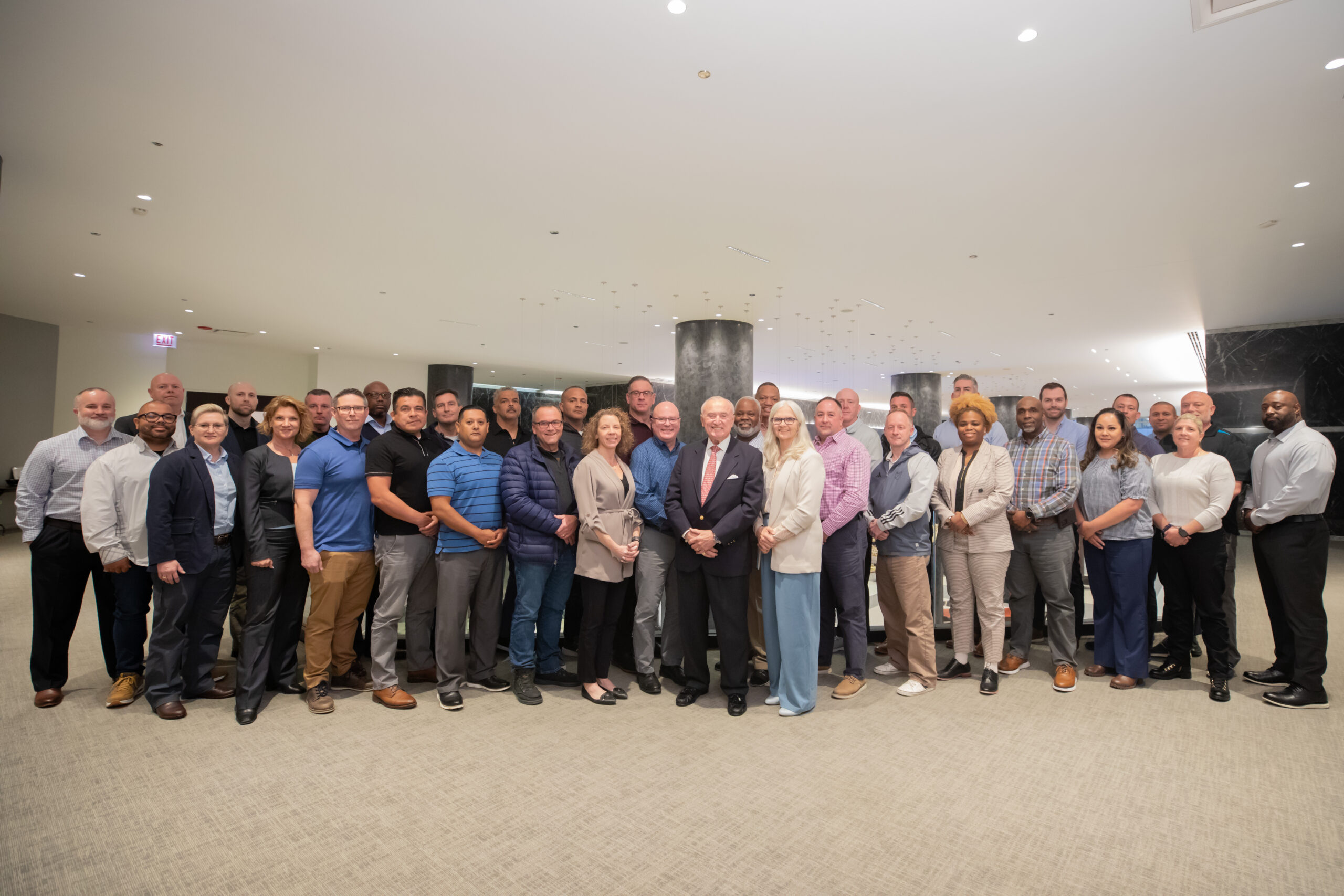 The second cohort of the University of Chicago Policing Leadership Academy gathers for a group photo with Commissioner Bill Bratton.